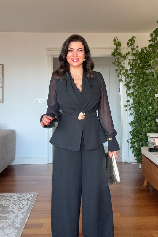 CROSSOVER NECKLINE SHEER SLEEVE WIDE-LEG JUMPSUIT WITH GOLD-TONE DETAILS - BLACK