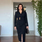 WRAP-STYLE V-NECK LONG-SLEEVE MIDI DRESS WITH DRAPING AND GOLD-TONE ACCENT - BLACK