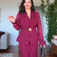 DRAPED CROSSOVER NECKLINE MIDI DRESS WITH GOLD-TONE BUCKLE DETAIL AND PEPLUM WAIST - BURGUNDY