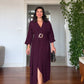 V-NECK BELTED DRESS WITH BUCKLE DETAIL AND ASYMMETRIC DRESS - BURGUNDY