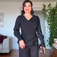 V-NECK ASYMMETRIC LAYERED WIDE-LEG JUMPSUIT WITH SHIMMERING DETAILS - BLACK