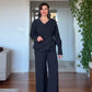 V-NECK ASYMMETRIC LAYERED WIDE-LEG JUMPSUIT WITH SHIMMERING DETAILS - BLACK