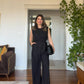 BELTED SLEEVELESS JUMPSUIT - BLACK