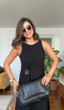 SLEEVELESS GOLD-BUCKLE MIDI DRESS – BLACK