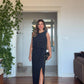 SLEEVELESS ELEGANT DRESS WITH SLIT DETAIL – BLACK