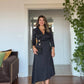 GOLD BUTTON DETAIL WRAP DRESS – BLACK